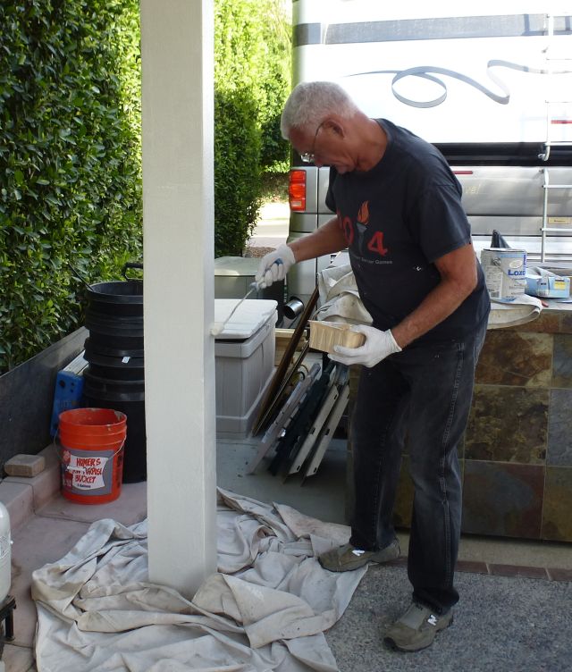 Jim painting pergola